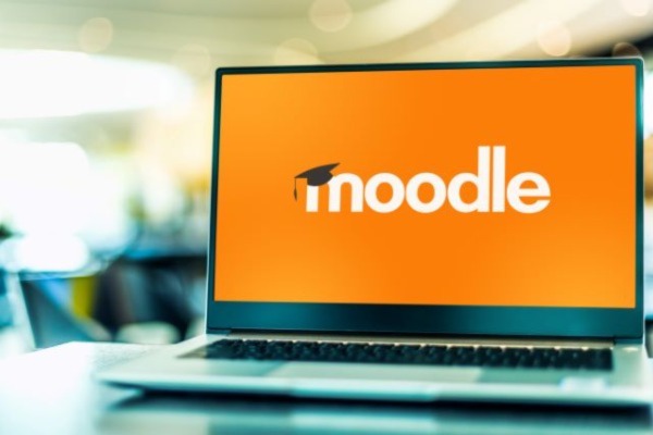 Laptop computer displaying logo of Moodle
